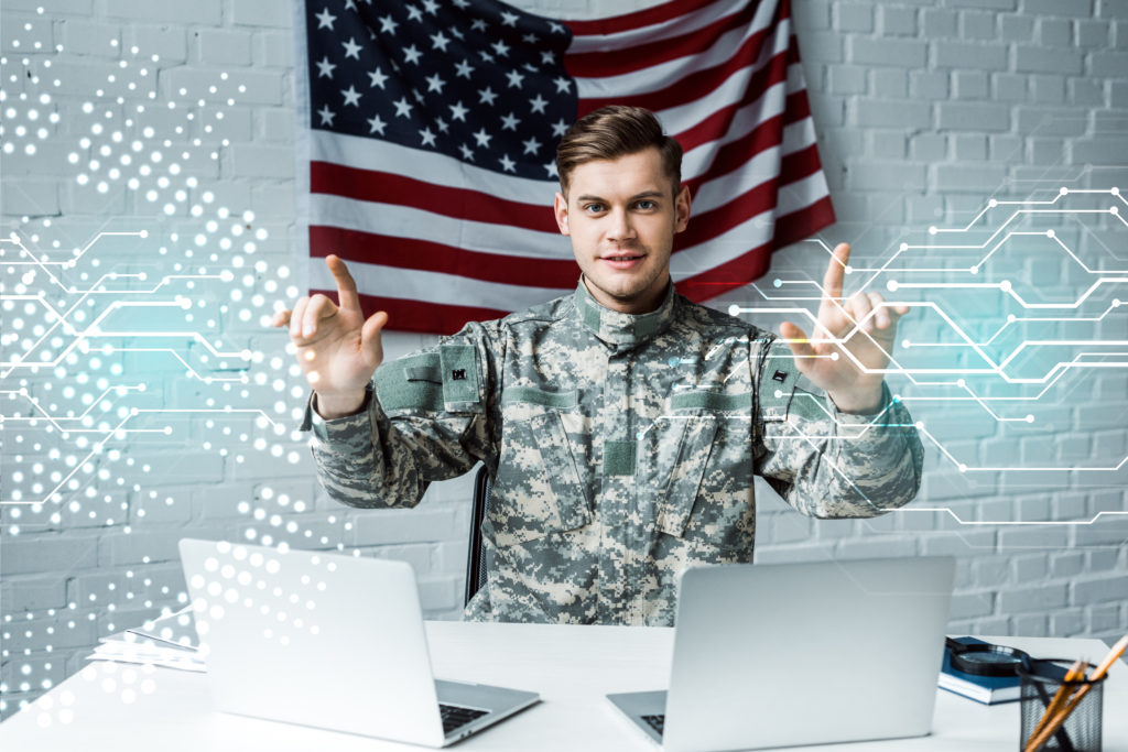 Military cyberdefense personnel securing cybersecurity network.